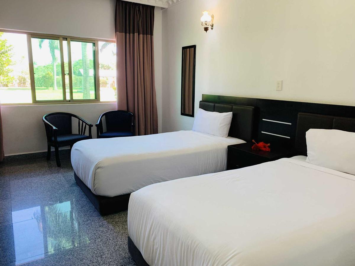 Standard Twin Room offered by Kupesi Tonga Hotel